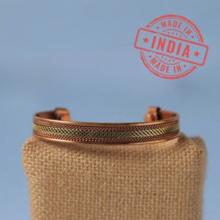 Two-tone copper bracelet. Adjustable, interlaced, copper and brass finishes.