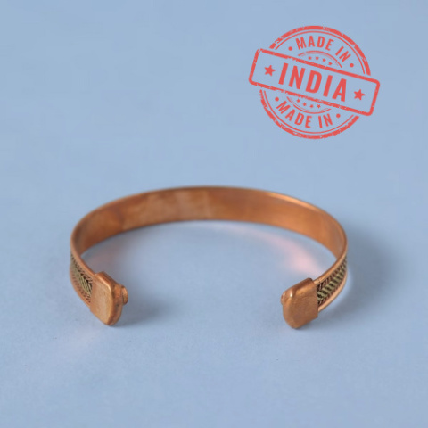 Two-tone copper bracelet. Adjustable, interlaced, copper and brass finishes.